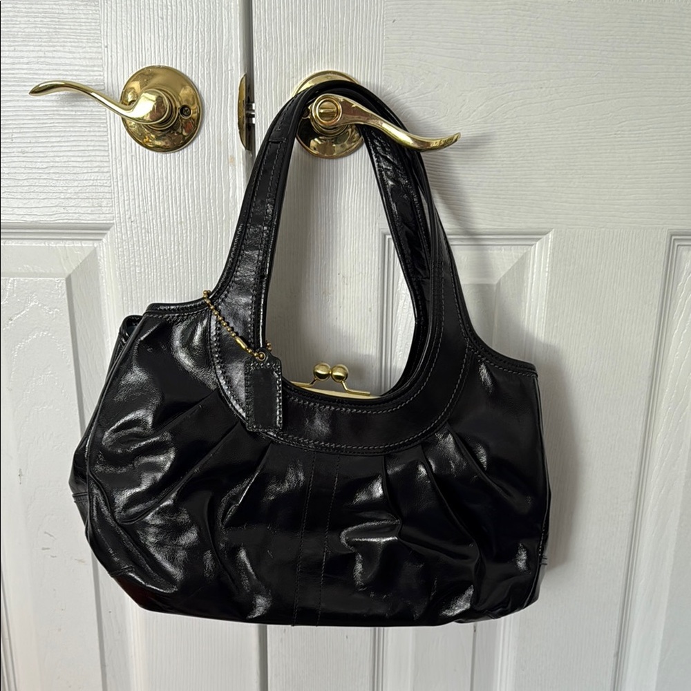 Coach Vintage Black Shoulder Bag with Slouchy Design